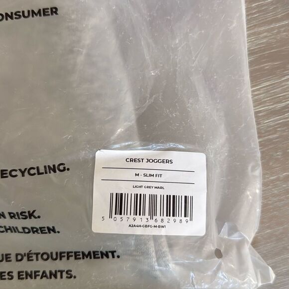 GYMSHARK CREST‎ JOGGERS
Slim Fit Light Grey Marl Medium NWT in packaging - Picture 9 of 10